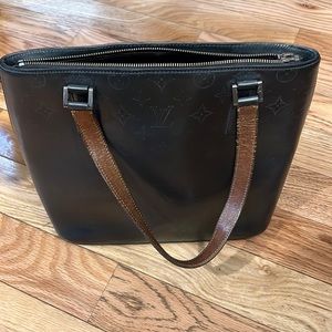 Grey Louis Vuitton Stockton bag in good condition. Wear on straps and bottom